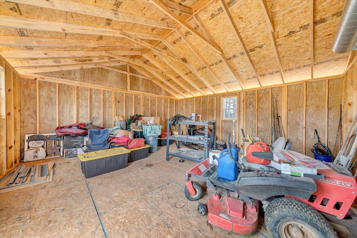 8013 Springwood Road Buchanan, VA 24066 - Photo 41 of 50 a living room with furniture and a chandelier