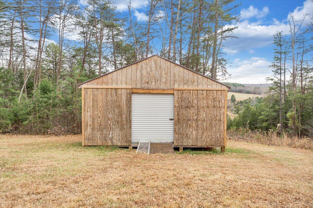 8013 Springwood Road Buchanan, VA 24066 - Photo 42 of 50 a view of backyard with small cabin