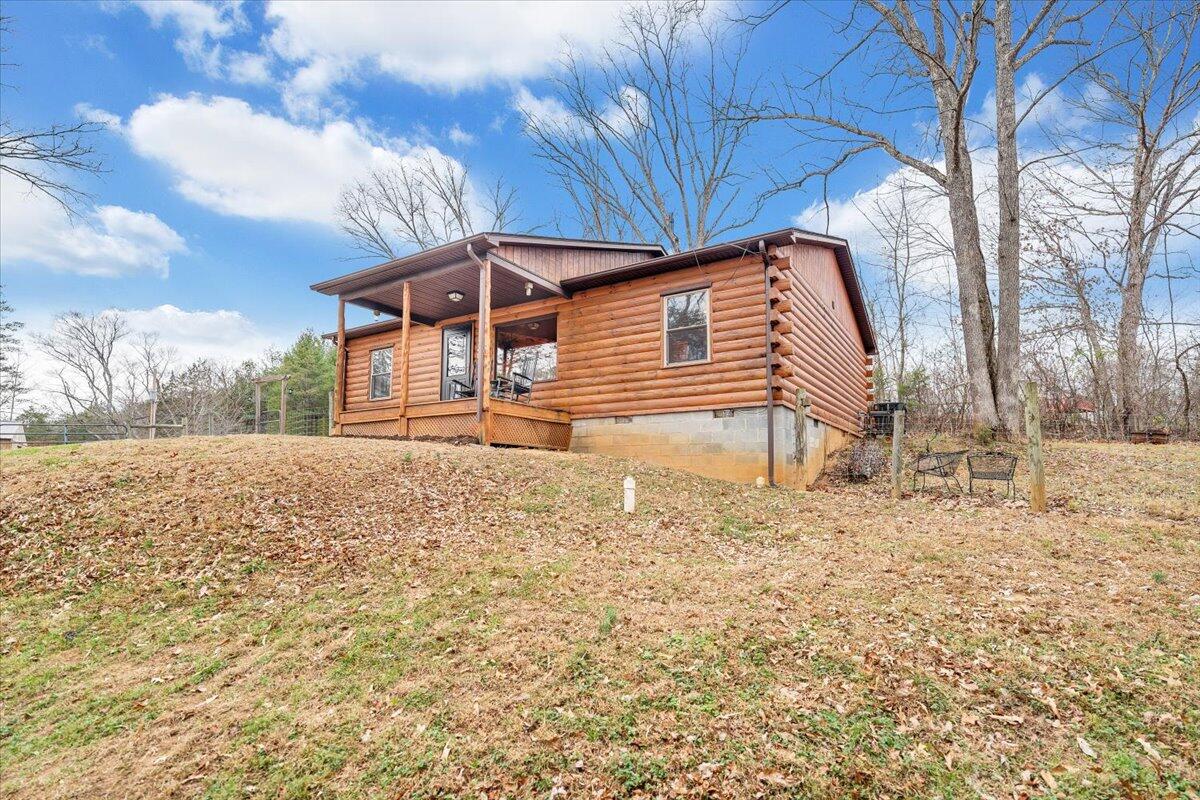 8013 Springwood Road Buchanan, VA 24066 - Photo 46 of 50 a front view of a house with a yard