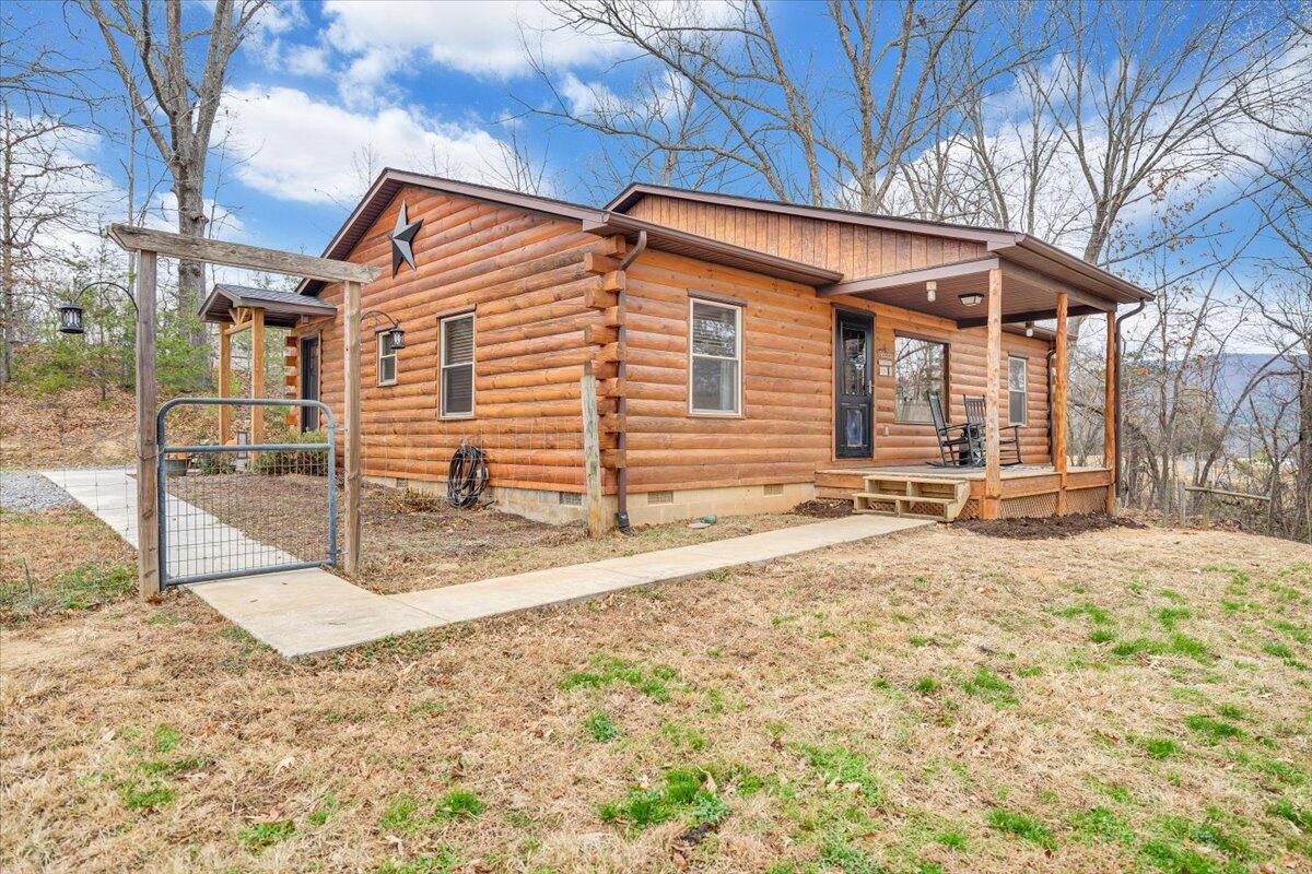8013 Springwood Road Buchanan, VA 24066 - Photo 8 of 50 a backyard of a house with shaded area