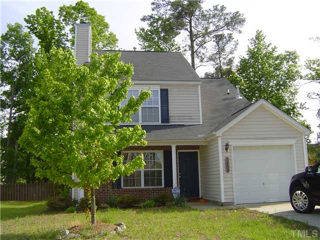 1204 Ricochet Drive Raleigh, NC 27610 - Photo 2 of 11 front view of a house with a yard
