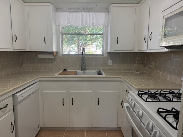 3411 Hickory Hollow Road Spring, TX 77380 - Photo 6 of 22 This kitchen has modern appliances and just the right amount of charm to make preparing meals a joy.