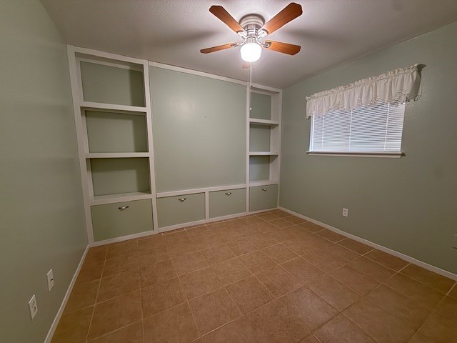 3411 Hickory Hollow Road Spring, TX 77380 - Photo 9 of 22 The second bedroom is loaded with charm and storage with these origianl built ins.