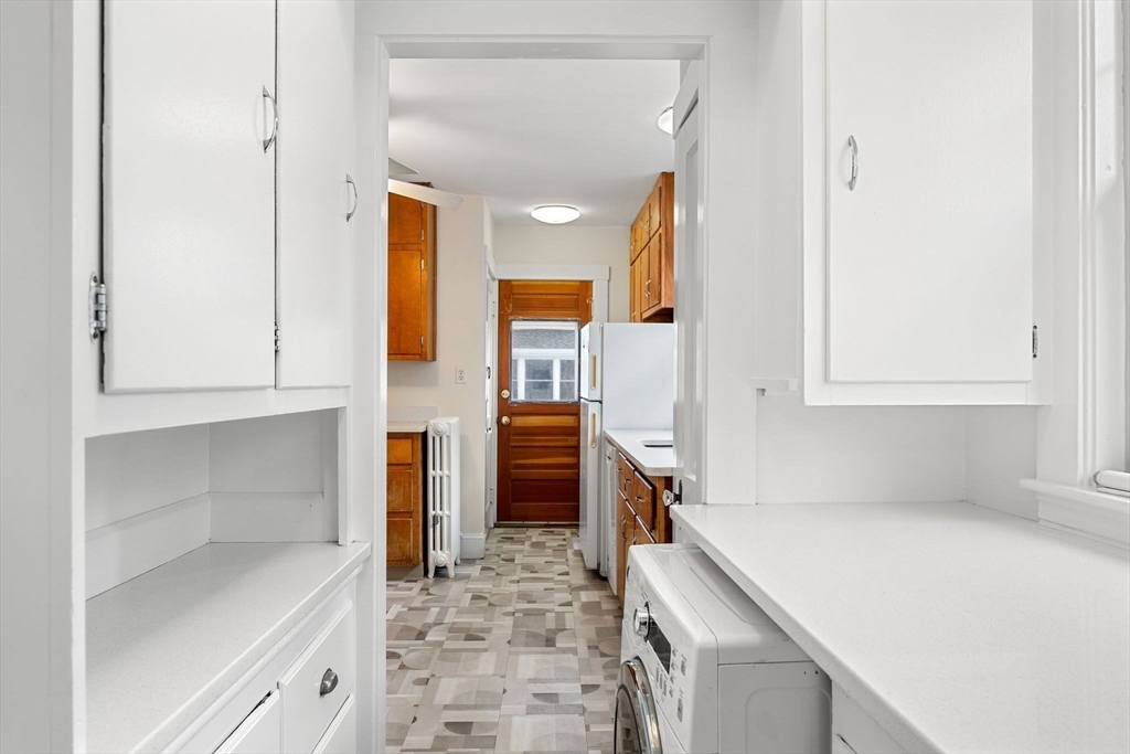 40-42 Upland Road Belmont, MA 02478 - Photo 24 of 35 a view of kitchen with furniture and cabinets