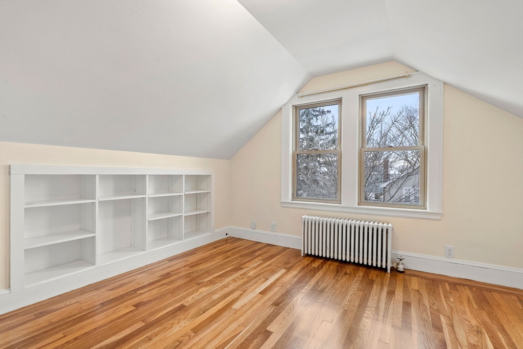 40-42 Upland Road Belmont, MA 02478 - Photo 26 of 35 an empty room with wooden floor and windows
