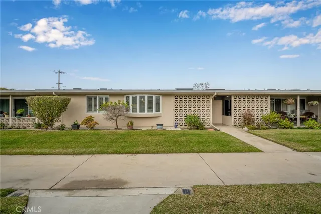 a view of a house with a swimming pool