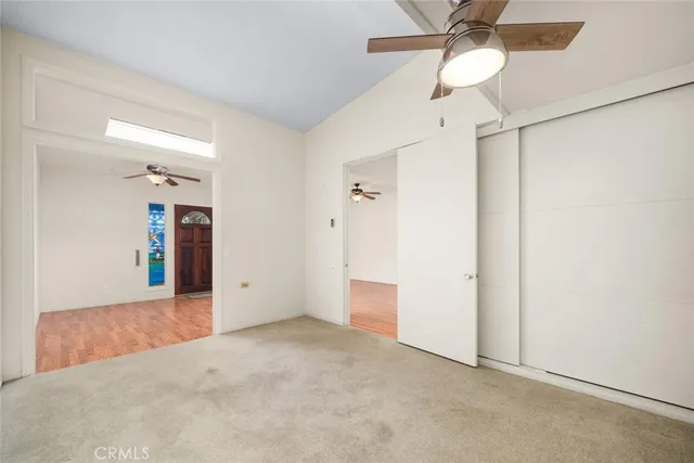 an empty room with a bathroom