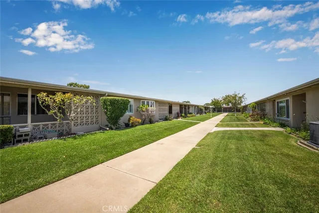 a view of a house with a swimming pool