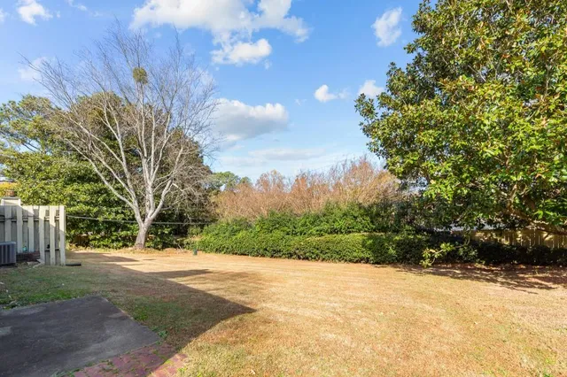 a view of swimming pool with an outdoor space and seating area