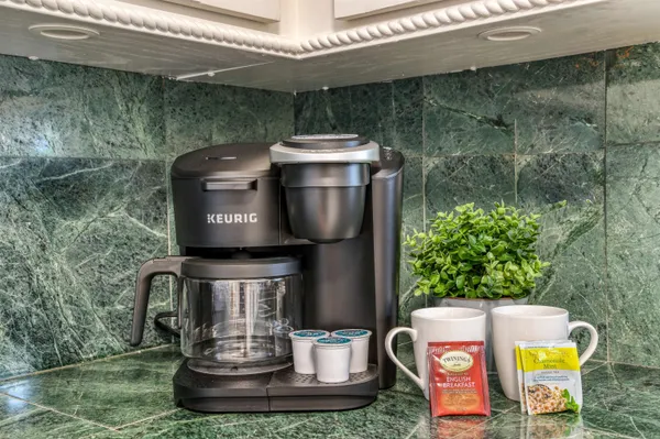 a living room with fireplace furniture and a flat screen tv