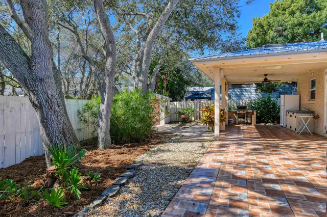 a bedroom with a bed and a table