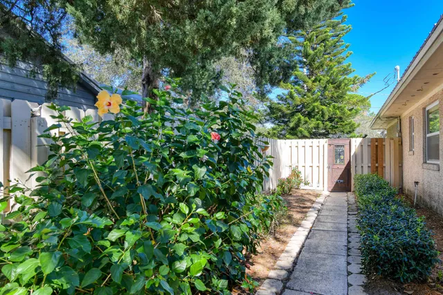 a bedroom with bed and window