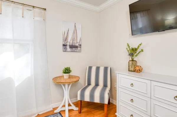 a bathroom with a double vanity sink mirror and toilet