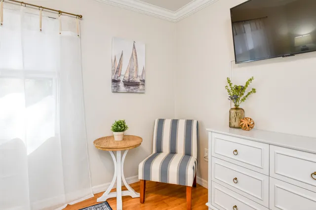 a bathroom with a double vanity sink mirror and toilet