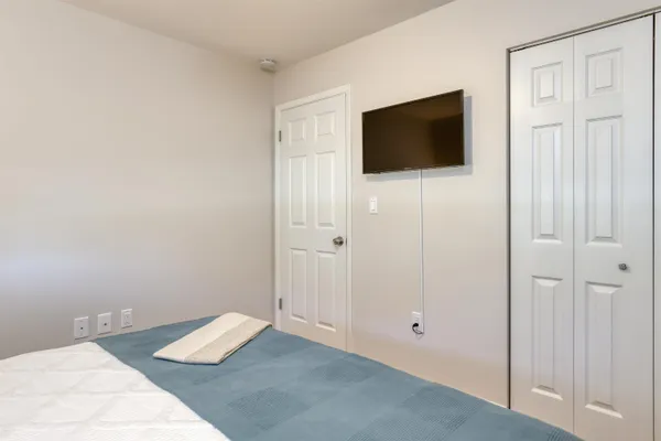 a bathroom with a bathtub and shower