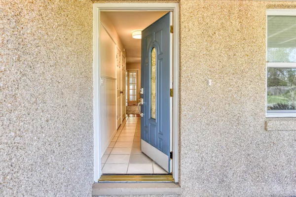 a view of a bathroom from the hallway