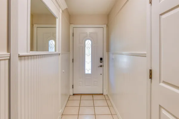 a view of a bathroom from a hallway