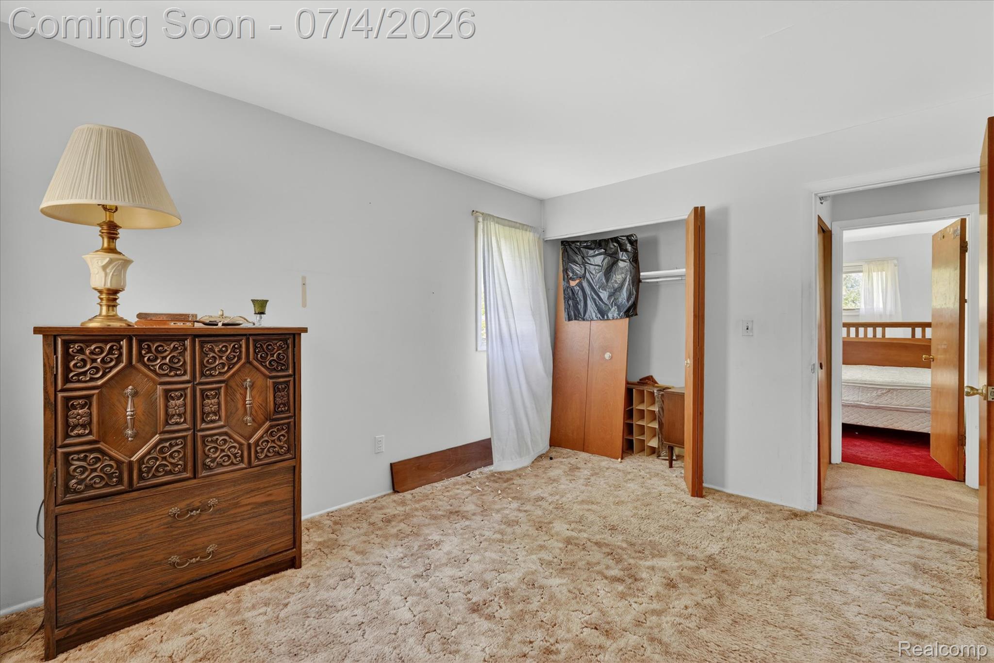 2091 North Irish Road Davison, MI 48423 - Photo 13 of 25 Bedroom featuring light-colored walls and carpeted flooring