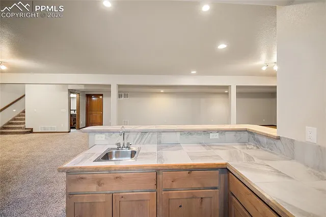 a bathroom with a toilet a sink and a bathtub
