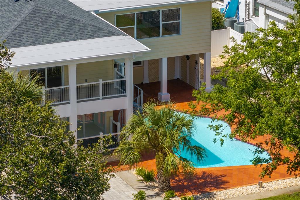 234 Driftwood Road Southeast St. Petersburg, FL 33705 - Photo 17 of 66 a front view of a house with a yard