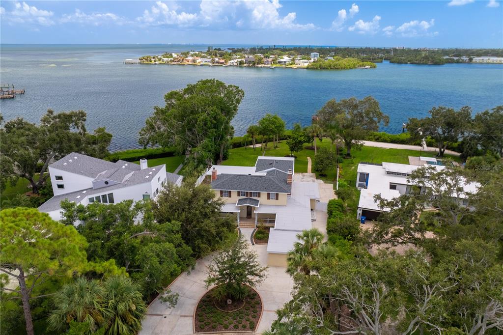 234 Driftwood Road Southeast St. Petersburg, FL 33705 - Photo 19 of 66 an aerial view of ocean and residential houses with outdoor space