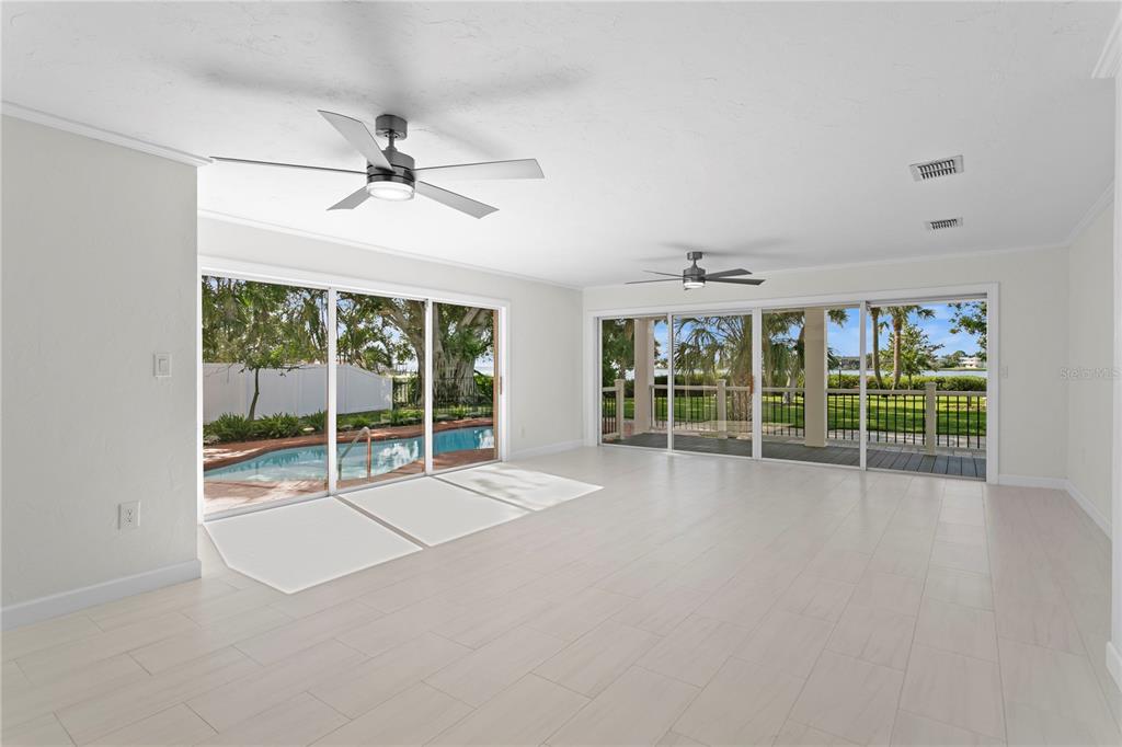 234 Driftwood Road Southeast St. Petersburg, FL 33705 - Photo 22 of 66 a view of an empty room with windows