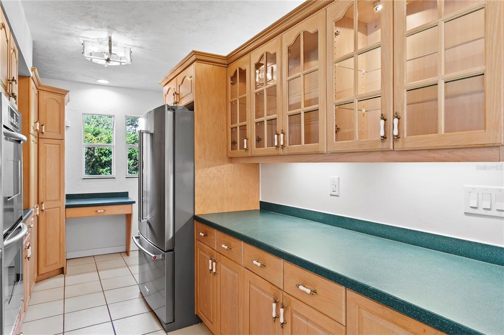 234 Driftwood Road Southeast St. Petersburg, FL 33705 - Photo 32 of 66 a kitchen with stainless steel appliances granite countertop a refrigerator and a sink