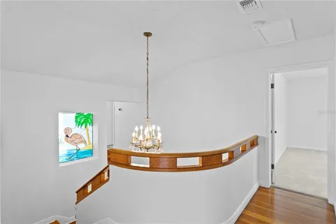 a view of a wooden deck and a yard