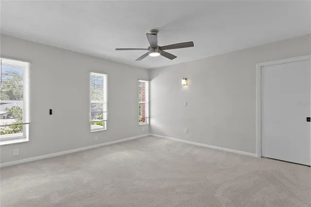 a view of park with large trees