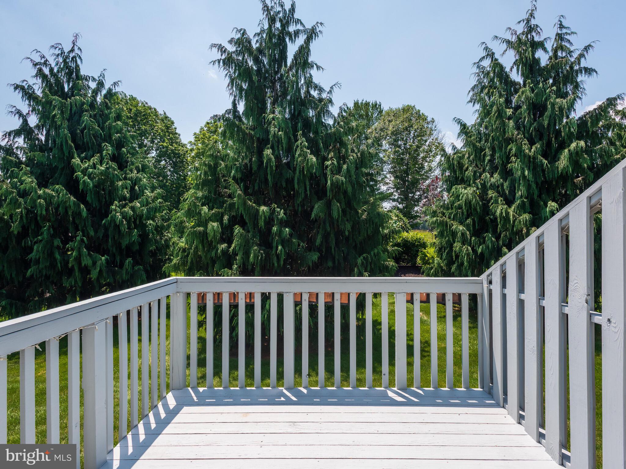 77 Buttonwood Drive, Unit 77 Exton, PA 19341 - Photo 8 of 29 a view of a wooden roof deck