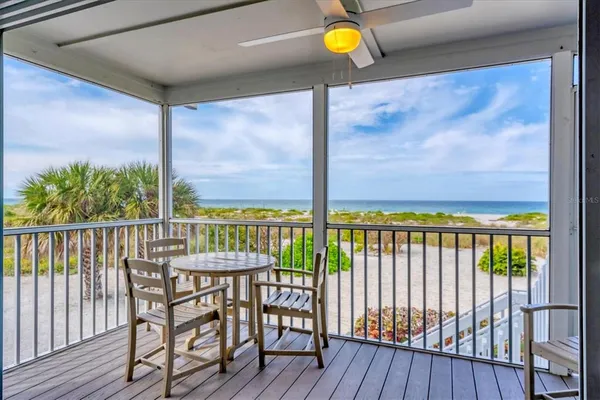 a view of a balcony with chair