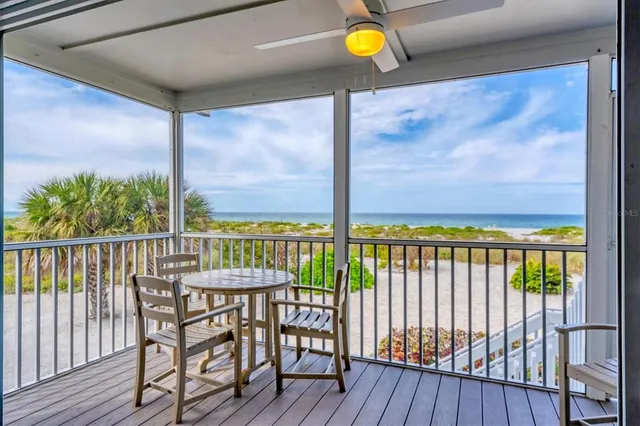 a view of a balcony with chair