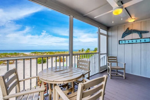 a view of a balcony with furniture