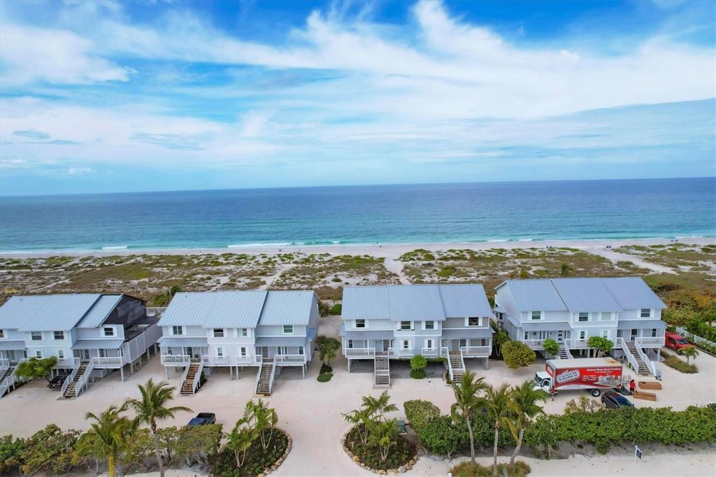 420 Gulf Boulevard, Unit 20 Boca Grande, FL 33921 - Photo 3 of 44 an aerial view of multiple house