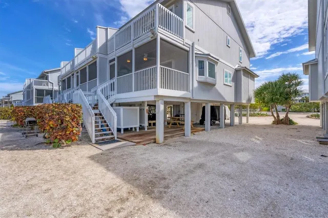 a view of a building with a yard
