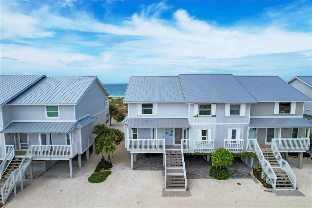 420 Gulf Boulevard, Unit 20 Boca Grande, FL 33921 - Photo 4 of 44 an aerial view of a house