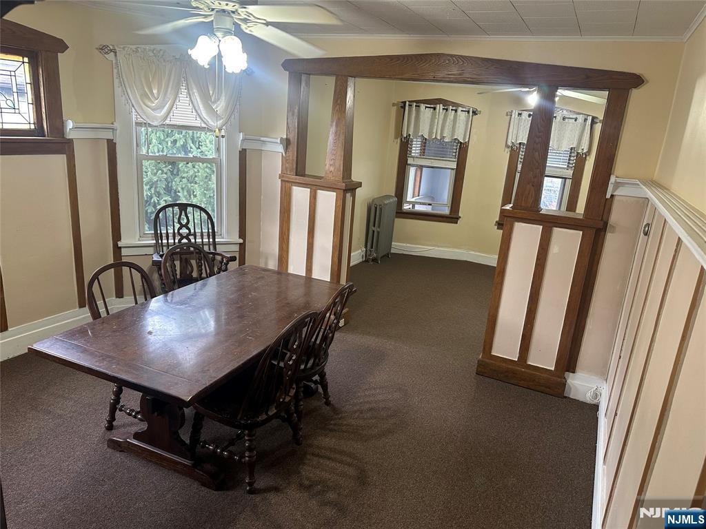 824 Paterson Avenue, Unit 2 East Rutherford, NJ 07073 - Photo 1 of 9 a view of a dining room with furniture window and wooden floor