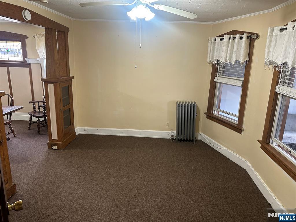 824 Paterson Avenue, Unit 2 East Rutherford, NJ 07073 - Photo 2 of 9 a view of a livingroom with furniture and staircase