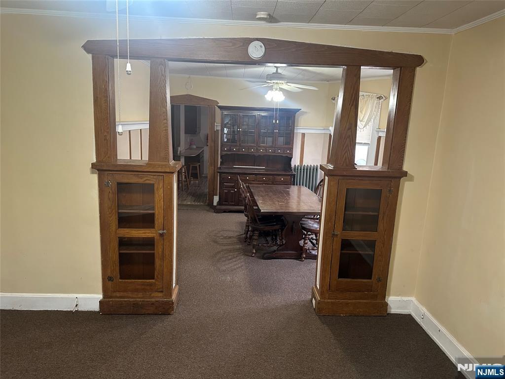 824 Paterson Avenue, Unit 2 East Rutherford, NJ 07073 - Photo 3 of 9 a living room with furniture and a window