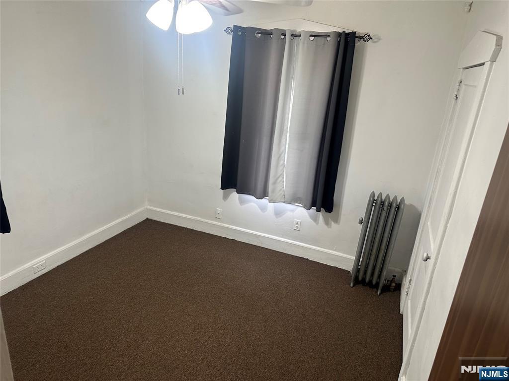 824 Paterson Avenue, Unit 2 East Rutherford, NJ 07073 - Photo 8 of 9 view of room with window and closet