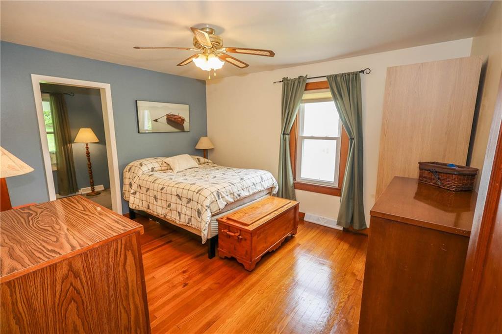 1265 Slippery Rock Road Grove City, PA 16127 - Photo 21 of 41 First floor master bedroom with gleaming hardwood floors!