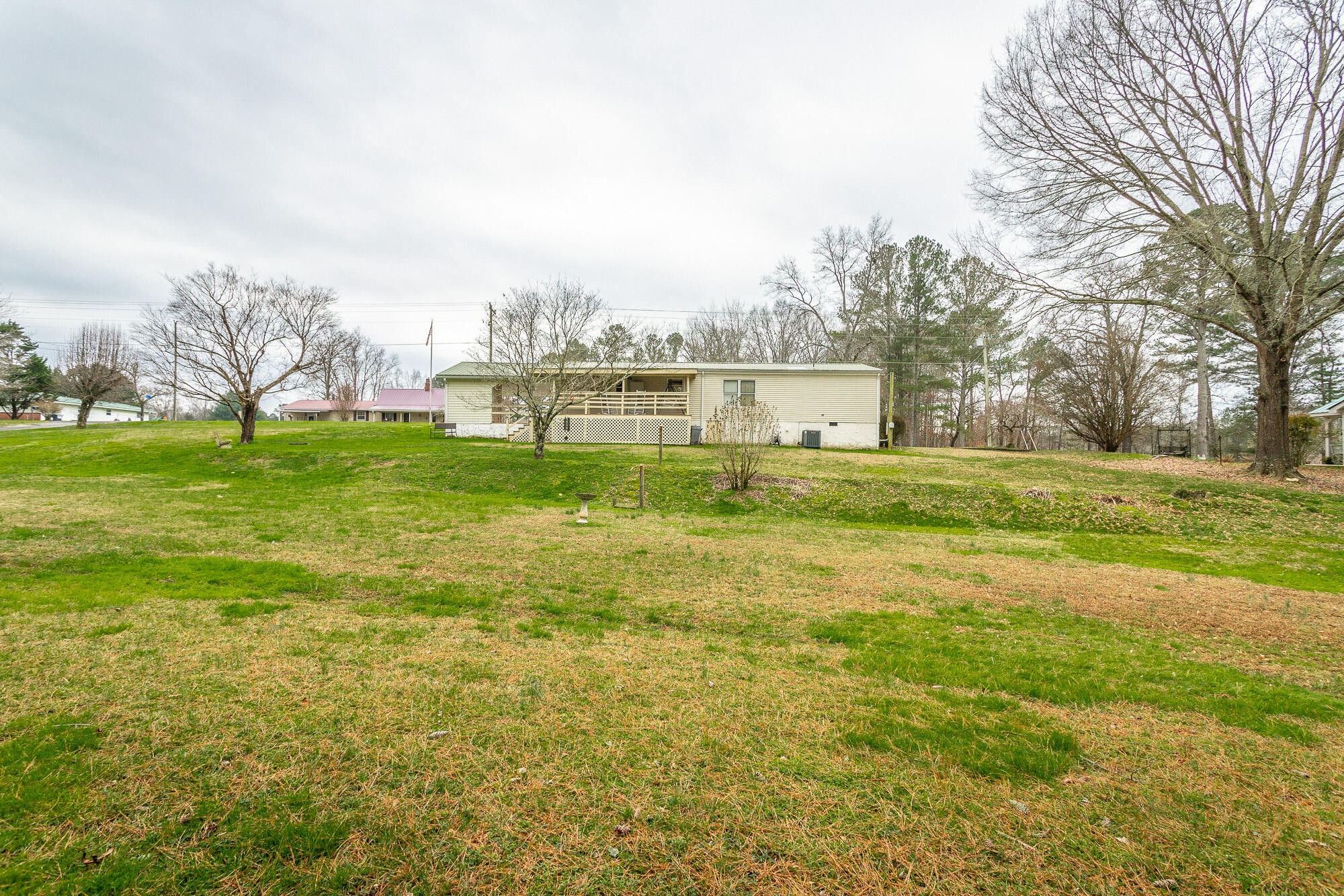 781 East Reed Road LaFayette, GA 30728 - Photo 16 of 73 a swimming pool with outdoor seating and yard