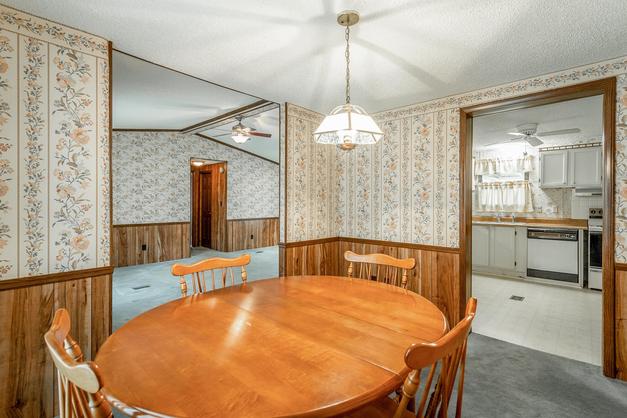 781 East Reed Road LaFayette, GA 30728 - Photo 28 of 73 a very nice looking dining room with a table and chairs
