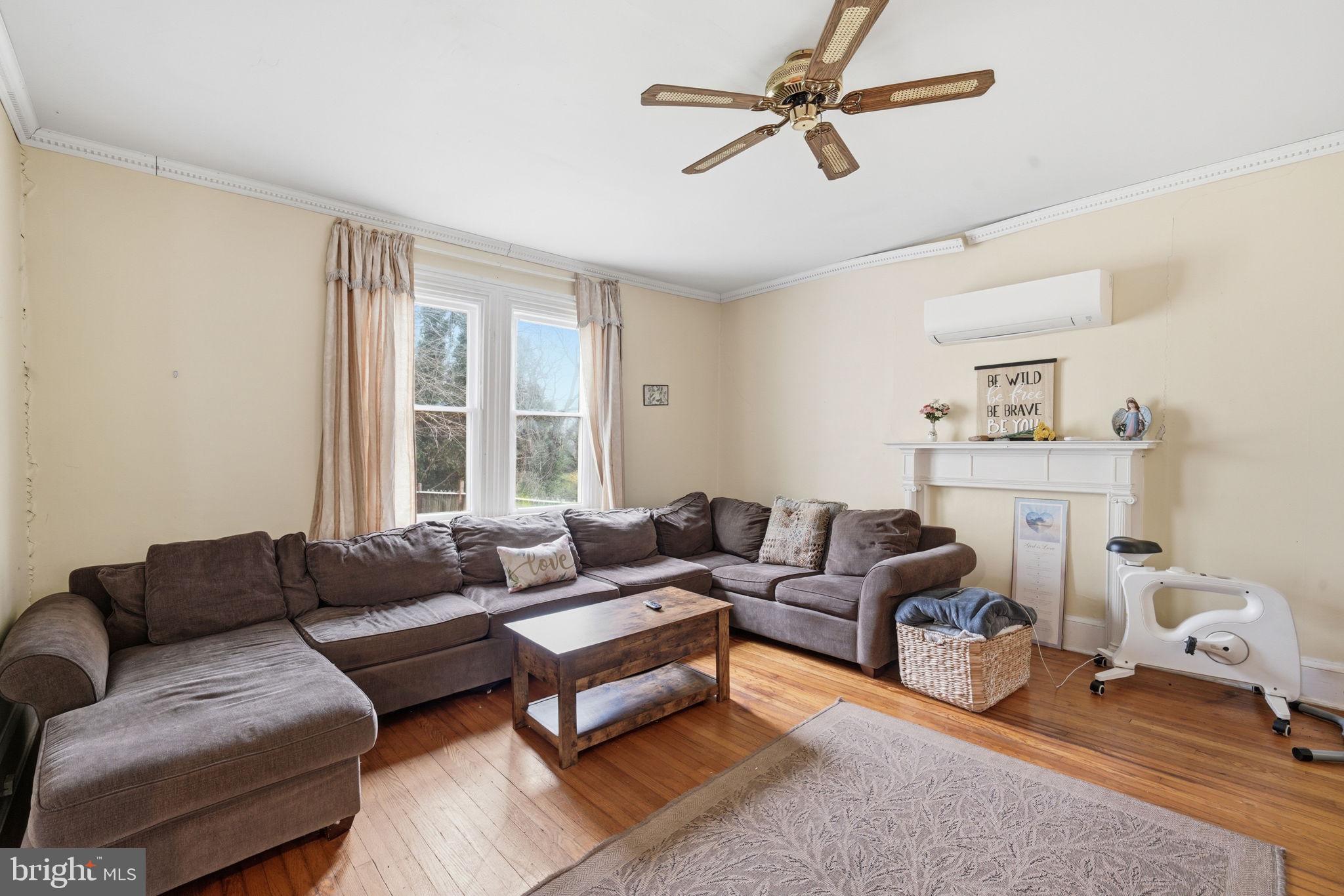 12733 Still Pond Road Still Pond, MD 21667 - Photo 6 of 21 a living room with furniture and a large window