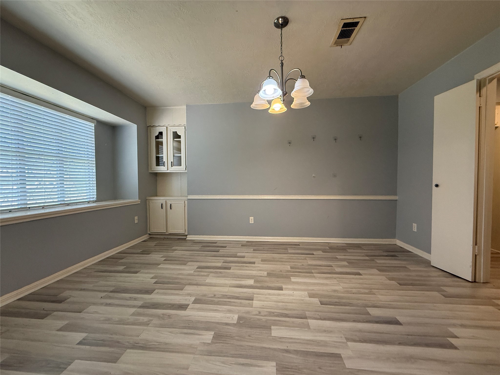 422 Gamewood Drive Spring, TX 77386 - Photo 7 of 25 a view of a livingroom with a chandelier