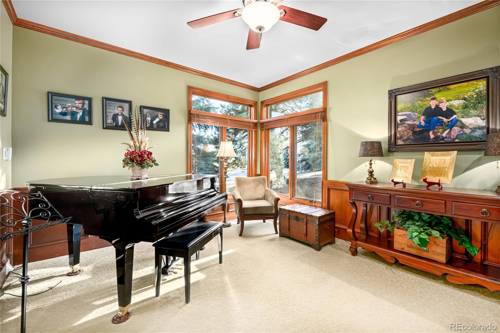 71 North Ranch Road Littleton, CO 80127 - Photo 18 of 40 a living room with furniture and a floor to ceiling window