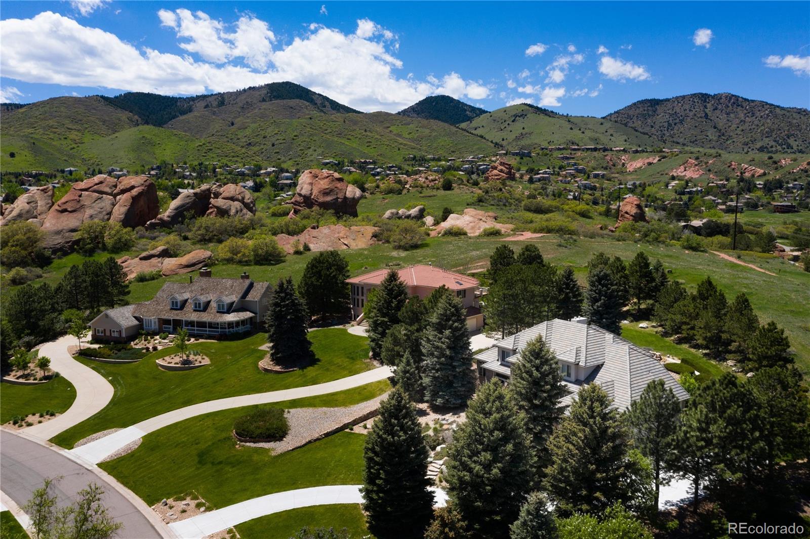 71 North Ranch Road Littleton, CO 80127 - Photo 2 of 40 a view of a lake with a mountain