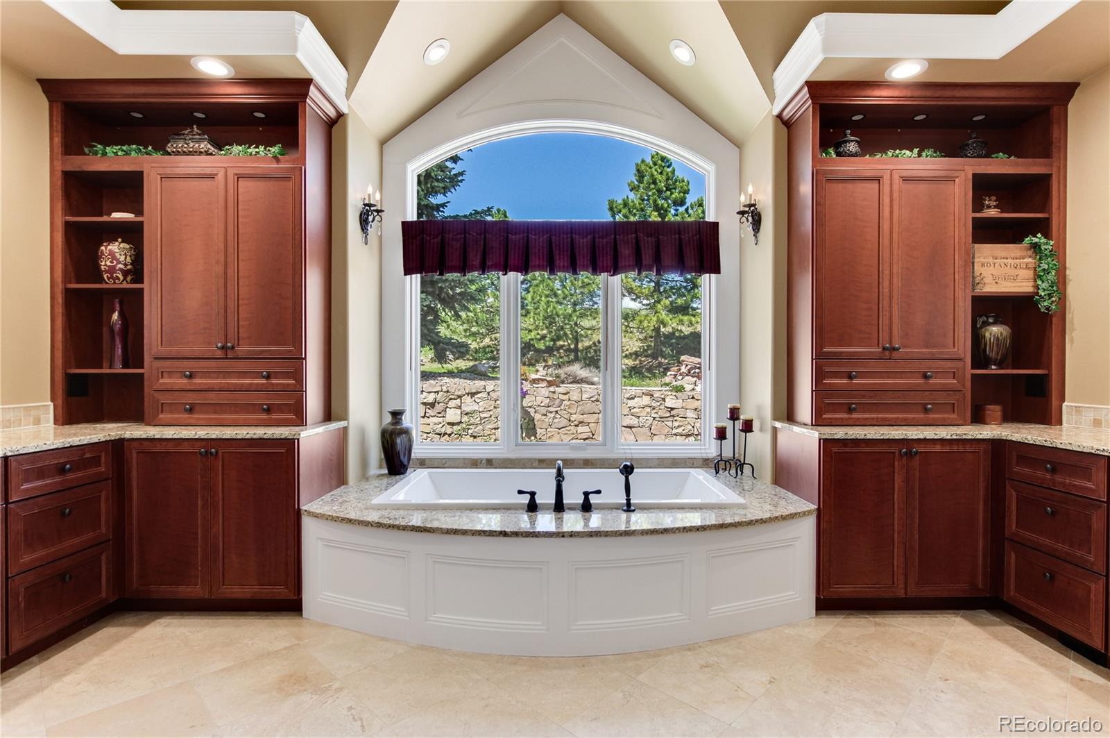 71 North Ranch Road Littleton, CO 80127 - Photo 21 of 40 a large tub sitting in a kitchen next to a window