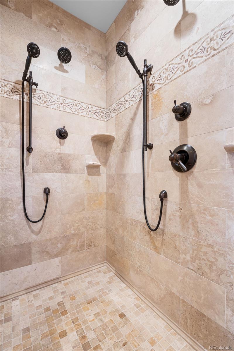 71 North Ranch Road Littleton, CO 80127 - Photo 24 of 40 a bathroom with a shower