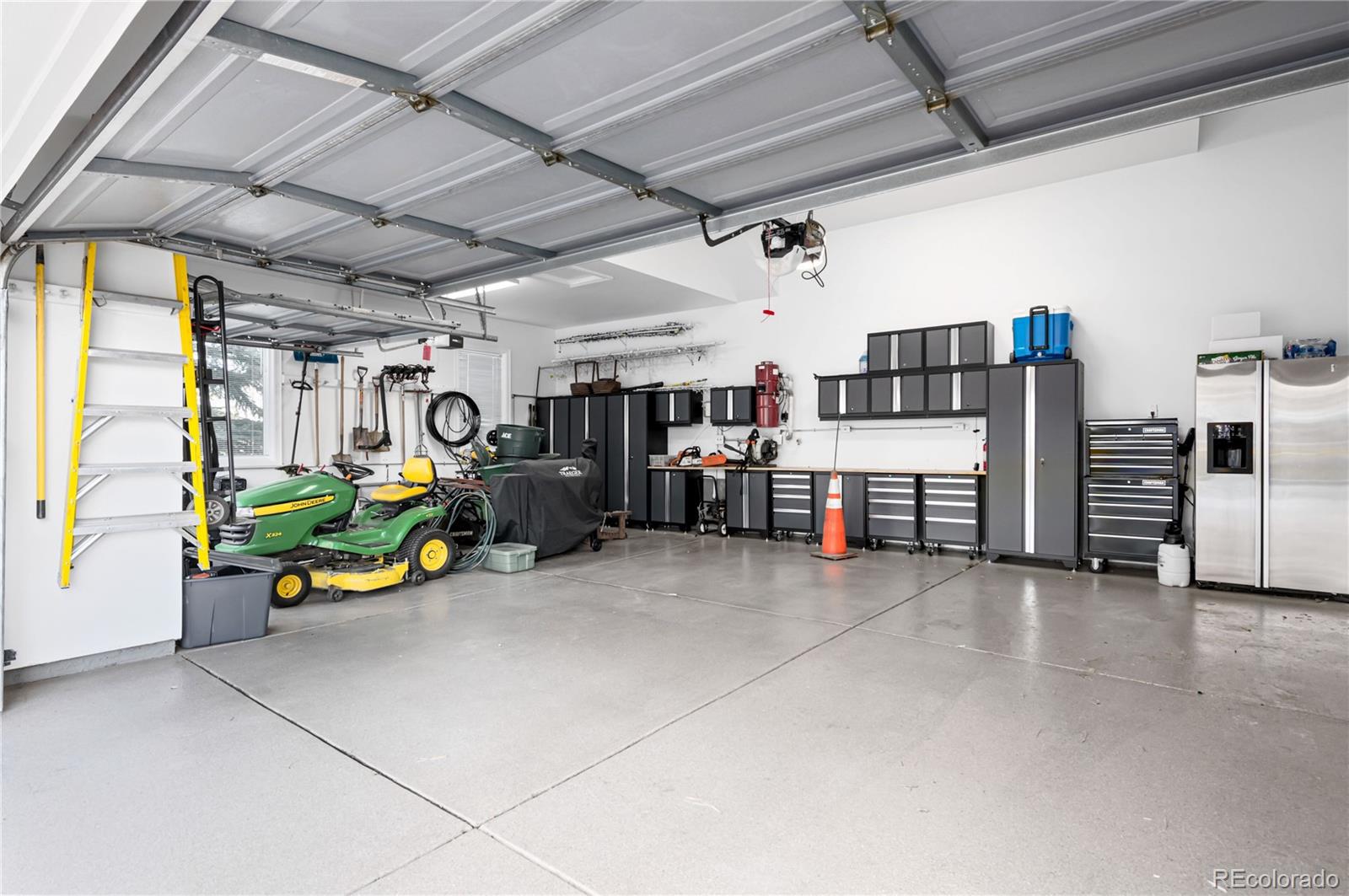 71 North Ranch Road Littleton, CO 80127 - Photo 30 of 40 a view of a garage with storage